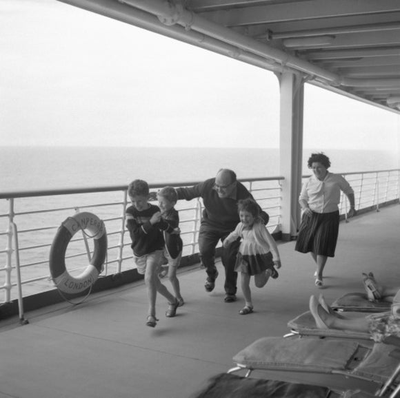 Children playing on CANBERRA's deck